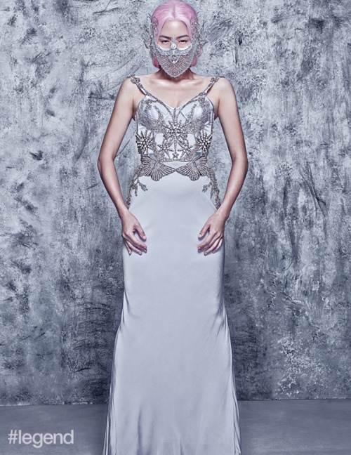 Dress by Alexander McQueen, mask by Tex Saverio